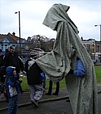 Death in a William Morris patterned shroud and Jonathan in an anorak